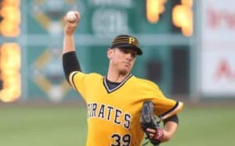 Jun 24, 2016; Pittsburgh, PA, USA; Pittsburgh Pirates starting pitcher Chad Kuhl (39) delivers a pitch against the Los Angeles Dodgers during the first inning at PNC Park. Mandatory Credit: Charles LeClaire-USA TODAY Sports