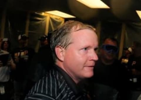 Sep 23, 2014; Atlanta, GA, USA; Pittsburgh Pirates general manager Neal Huntington shown in the locker room after clinching a playoff spot by defeating the Atlanta Braves at Turner Field. The Pirates defeated the Braves 3-2. Mandatory Credit: Dale Zanine-USA TODAY Sports