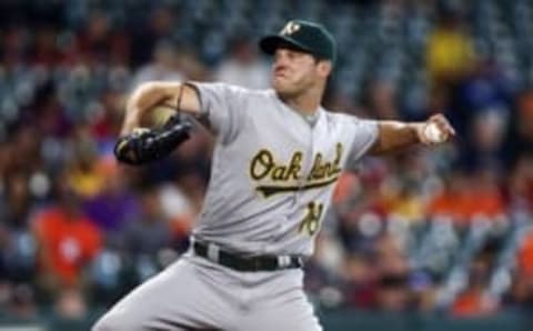 Jul 7, 2016; Houston, TX, USA; Oakland Athletics starting pitcher Rich Hill (18) delivers a pitch during the first inning against the Houston Astros at Minute Maid Park. Mandatory Credit: Troy Taormina-USA TODAY Sports