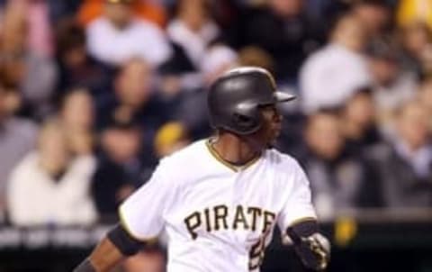 May 17, 2016; Pittsburgh, PA, USA; Pittsburgh Pirates pinch hitter Alen Hanson (59) singles for his first major league hit against the Atlanta Braves during the fifth inning at PNC Park. Mandatory Credit: Charles LeClaire-USA TODAY Sports