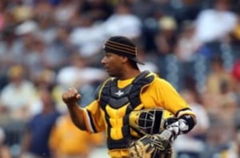 Jul 24, 2016; Pittsburgh, PA, USA; Pittsburgh Pirates catcher Elias Diaz (32) gestures on the field against the Philadelphia Phillies during the eighth inning at PNC Park. Mandatory Credit: Charles LeClaire-USA TODAY Sports