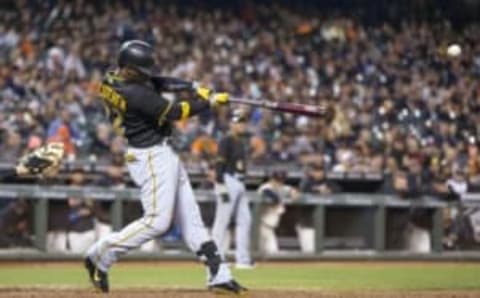 Aug 15, 2016; San Francisco, CA, USA; Pittsburgh Pirates center fielder Andrew McCutchen (22) hits a single driving in a run in the eight inning against the San Francisco Giants at AT&T Park. Mandatory Credit: Neville E. Guard-USA TODAY Sports