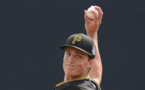 Mar 5, 2016; Lake Buena Vista, FL, USA; Pittsburgh Pirates starting pitcher Tyler Glasnow (51) warms up before the start of the spring training game against the Atlanta Braves at Champion Stadium. Mandatory Credit: Jonathan Dyer-USA TODAY Sports