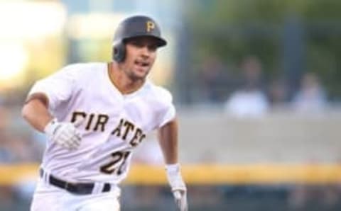 Aug 23, 2016; Pittsburgh, PA, USA; Pittsburgh Pirates second baseman Adam Frazier (26) runs the bases on his way to scoring a run against the Houston Astros during the first inning at PNC Park. Mandatory Credit: Charles LeClaire-USA TODAY Sports