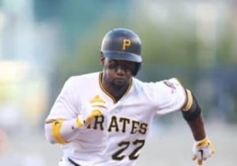 Aug 23, 2016; Pittsburgh, PA, USA; Pittsburgh Pirates center fielder Andrew McCutchen (22) runs the bases on his way to scoring a run against the Houston Astros during the first inning at PNC Park. Mandatory Credit: Charles LeClaire-USA TODAY Sports