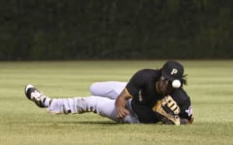 Aug 30, 2016; Chicago, IL, USA; Pittsburgh Pirates first baseman Josh Bell (55) cannot catch a double hit by Chicago Cubs third baseman Kris Bryant (not pictured) during the third inning at Wrigley Field. Mandatory Credit: David Banks-USA TODAY Sports