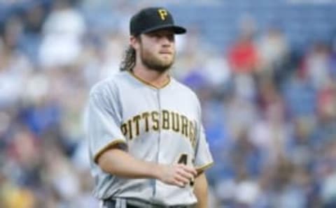 Aug 2, 2016; Atlanta, GA, USA; Pittsburgh Pirates starting pitcher Gerrit Cole (45) in action against the Atlanta Braves in the first inning at Turner Field. Mandatory Credit: Brett Davis-USA TODAY Sports