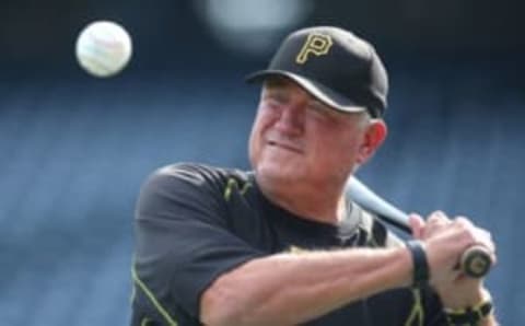 Aug 23, 2016; Pittsburgh, PA, USA; Pittsburgh Pirates manager Clint Hurdle (13) hits balls during infield practice before playing the Houston Astros at PNC Park. Mandatory Credit: Charles LeClaire-USA TODAY Sports