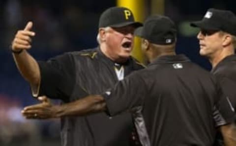 Sep 13, 2016; Philadelphia, PA, USA; Pittsburgh Pirates manager Clint Hurdle (L) argues a call with first base umpire Alan Porter (64) after being ejected during the sixth inning at Citizens Bank Park. Mandatory Credit: Bill Streicher-USA TODAY Sports