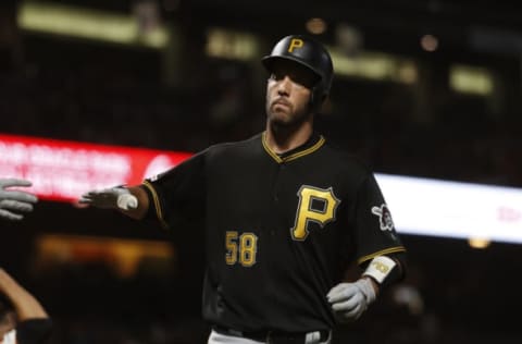 SAN FRANCISCO, CA – SEPTEMBER 09: Jacob Stallings #58 of the Pittsburgh Pirates is congratulated at home plate after scoring on a solo home run during the fifth inning against the San Francisco Giants at Oracle Park on September 9, 2019 in San Francisco, California. (Photo by Stephen Lam/Getty Images)