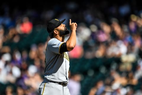 DENVER, CO – SEPTEMBER 1: Richard Rodriguez #48 of the Pittsburgh Pirates points to the sky to celebrate after recording the final out of the seventh inning against the Colorado Rockies at Coors Field on September 1, 2019 in Denver, Colorado. (Photo by Dustin Bradford/Getty Images)