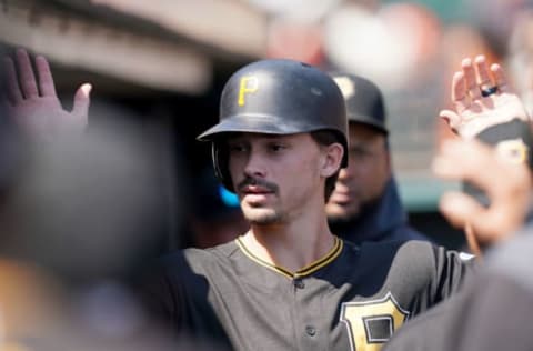 SAN FRANCISCO, CALIFORNIA – SEPTEMBER 12: Bryan Reynolds #10 of the Pittsburgh Pirates is congratulated by teammates after scoring against the San Francisco Giants in the top of the first inning at Oracle Park on September 12, 2019 in San Francisco, California. (Photo by Thearon W. Henderson/Getty Images)