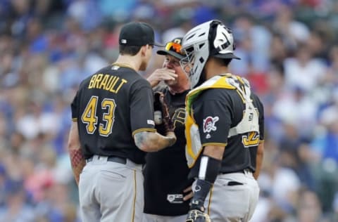 CHICAGO, ILLINOIS – SEPTEMBER 13: Pitching coach Ray Searage #54 of the Pittsburgh Pirates visits the mound to talk with Steven Brault #43 during the third inning of a game against the Chicago Cubs at Wrigley Field on September 13, 2019 in Chicago, Illinois. (Photo by Nuccio DiNuzzo/Getty Images)