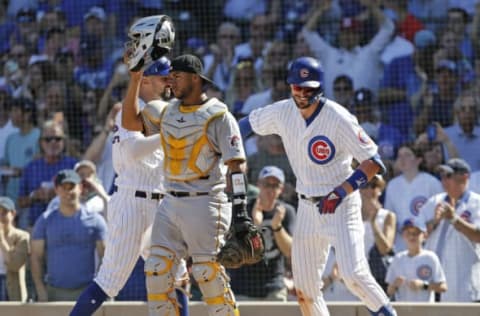 CHICAGO, ILLINOIS – SEPTEMBER 14: Kris Bryant #17 of the Chicago Cubs is congratulated by Nicholas Castellanos #6 following his two run home run during the fourth inning of a game against the Pittsburgh Pirates at Wrigley Field on September 14, 2019 in Chicago, Illinois. (Photo by Nuccio DiNuzzo/Getty Images)