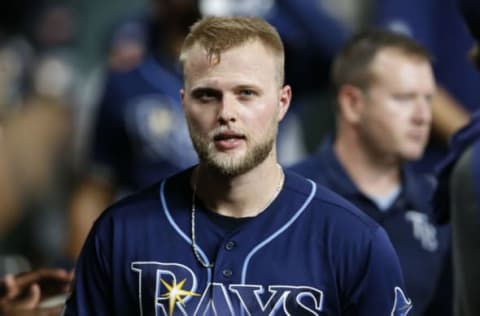 HOUSTON, TEXAS – OCTOBER 05: Austin Meadows #17 of the Tampa Bay Rays looks on from the dug out after he scored in the ninth inning against the Houston Astros during Game 2 of the ALDS at Minute Maid Park on October 05, 2019 in Houston, Texas. (Photo by Tim Warner/Getty Images)