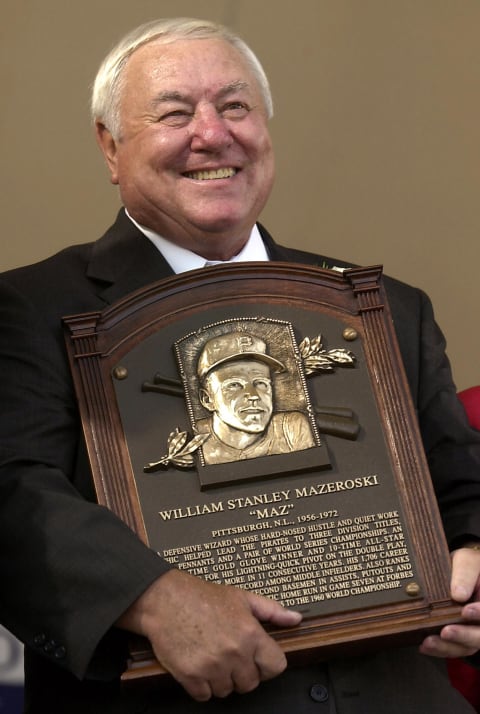 Baseball Hall of Fame inductee Bill Mazeroski of the Pittsburgh Pirates holds up his plaque during induction ceremonies in Cooperstown, NY on 05 August, 2001. AFP PHOTO/Henny Ray ABRAMS (Photo by HENNY RAY ABRAMS / AFP) (Photo by HENNY RAY ABRAMS/AFP via Getty Images)