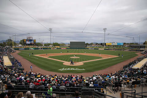 MESA, ARIZONA – MARCH 10: General view of action as starting pitcher Mike Fiers #50 of the Oakland Athletics pitches against the Kansas City Royals during the third inning of the MLB spring training game at HoHoKam Stadium on March 10, 2020 in Mesa, Arizona. (Photo by Christian Petersen/Getty Images)