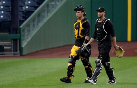 PITTSBURGH, PA – JULY 07: Luke Maile #14 and Jacob Stallings #58 of the Pittsburgh Pirates walk in from the bullpen during summer workouts at PNC Park on July 7, 2020 in Pittsburgh, Pennsylvania. (Photo by Justin Berl/Getty Images)