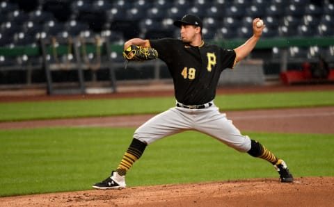 PITTSBURGH, PA – JULY 07: Derek Holland #49 of the Pittsburgh Pirates delivers a pitch during summer workouts at PNC Park on July 7, 2020 in Pittsburgh, Pennsylvania. (Photo by Justin Berl/Getty Images)