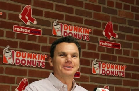 BOSTON, MA – AUGUST 25: Ben Cherington, general manager of the Boston Red Sox smiles as he announces a trade between the Boston Red Sox and the Los Angeles Dodgers during a press conference at Fenway Park on August 25, 2012 in Boston, Massachusetts. The Red Sox traded Josh Beckett, Carl Crawford, Andrian Gonzalez and Nick Punto for Dodgers players James Lonely, Ivan DeJesus Jr., Allen webster, and two others to be named later. (Photo by Jim Rogash/Getty Images)