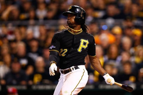 PITTSBURGH, PA – OCTOBER 01: Andrew McCutchen #22 of the Pittsburgh Pirates hits a single in the sixth inning against the Cincinnati Reds during the National League Wild Card game at PNC Park on October 1, 2013 in Pittsburgh, Pennsylvania. (Photo by Jared Wickerham/Getty Images)