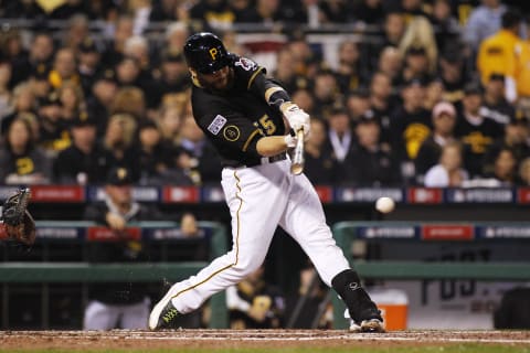 PITTSBURGH, PA – OCTOBER 01: Russell Martin #55 of the Pittsburgh Pirates hits a single in the second inning against the San Francisco Giants during the National League Wild Card game at PNC Park on October 1, 2014 in Pittsburgh, Pennsylvania. (Photo by Justin K. Aller/Getty Images)