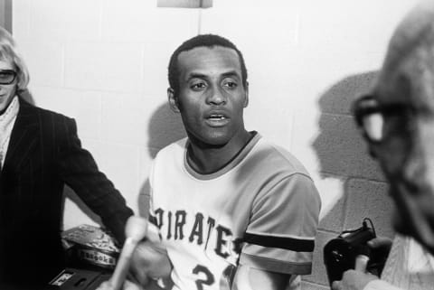 PITTSBURGH – Roberto Clemente #21 of the Pittsburgh Pirates talks to the media after getting his 3000th hit against the New York Mets at Three Rivers Stadium on September 30, 1972 in Pittsburgh, Pennsylvania. (Photo by: Morris Berman/MLB Photos via Getty Images)