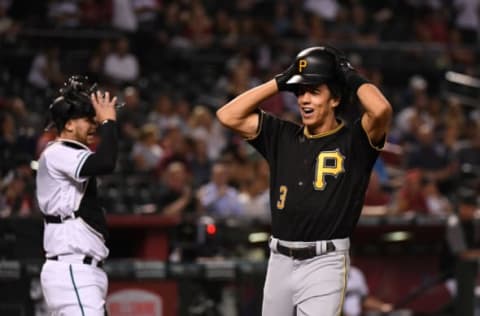 PHOENIX, ARIZONA – MAY 14: Native Arizonian Cole Tucker #3 of the Pittsburgh Pirates celebrates after hitting a two-run home run off of Zack Godley #52 of the Arizona Diamondbacks during the eighth inning at Chase Field on May 14, 2019 in Phoenix, Arizona. (Photo by Norm Hall/Getty Images)