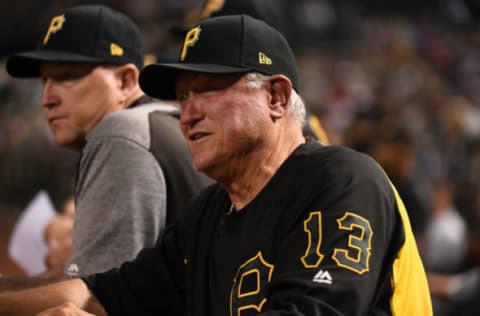 PHOENIX, ARIZONA – MAY 14: Manager Clint Hurdle #13 of the Pittsburgh Pirates looks on from the top step of the dugout during the eighth inning of a game against the Arizona Diamondbacks at Chase Field on May 14, 2019 in Phoenix, Arizona. (Photo by Norm Hall/Getty Images)