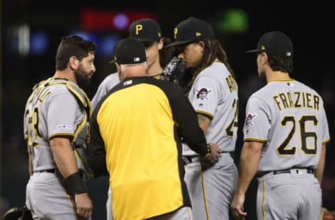 PHOENIX, ARIZONA – MAY 15: (L-R) Francisco Cervelli #29, pitching coach Ray Searage #54 and Chris Archer #24 of the Pittsburgh Pirates talk on the mound during the first inning of the MLB game against the Arizona Diamondbacks at Chase Field on May 15, 2019 in Phoenix, Arizona. (Photo by Jennifer Stewart/Getty Images)