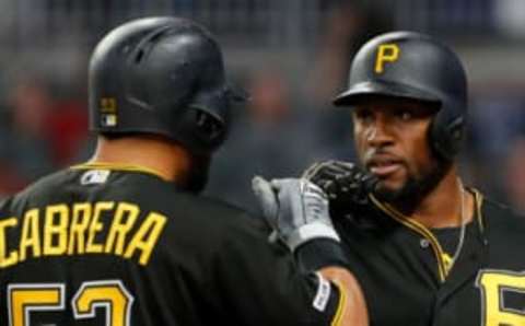 ATLANTA, GEORGIA – JUNE 12: Starling Marte #6 of the Pittsburgh Pirates reacts with Melky Cabrera #53 after hitting a solo homer in the fifth inning against the Atlanta Braves at SunTrust Park on June 12, 2019 in Atlanta, Georgia. (Photo by Kevin C. Cox/Getty Images)