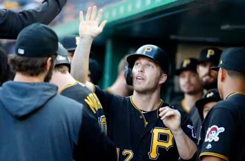 PITTSBURGH, PA – JULY 24: Corey Dickerson #12 of the Pittsburgh Pirates celebrates after scoring on a sacrifice fly in the first inning against the St. Louis Cardinals at PNC Park on July 24, 2019 in Pittsburgh, Pennsylvania. (Photo by Justin K. Aller/Getty Images)