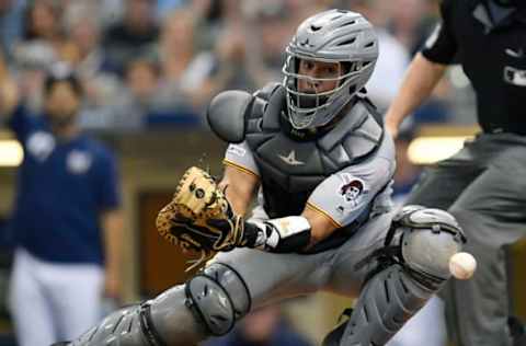 MILWAUKEE, WISCONSIN – JUNE 30: Elias Diaz #32 of the Pittsburgh Pirates can’t make the catch at home plate in the fourth inning against the Milwaukee Brewers at Miller Park on June 30, 2019 in Milwaukee, Wisconsin. (Photo by Quinn Harris/Getty Images)