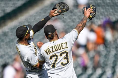 DENVER, CO – SEPTEMBER 1: Starling Marte #6 and Felipe Vazquez #73 of the Pittsburgh Pirates celebrate after a 6-2 win over the Colorado Rockies at Coors Field on September 1, 2019 in Denver, Colorado. (Photo by Dustin Bradford/Getty Images)