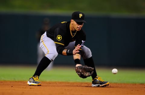 ST. LOUIS, MO – AUGUST 26: Ronny Cedeno #5 of the Pittsburgh Pirates fields a ground ball against the St. Louis Cardinals at Busch Stadium on August 26, 2011 in St. Louis, Missouri. (Photo by Jeff Curry/Getty Images)