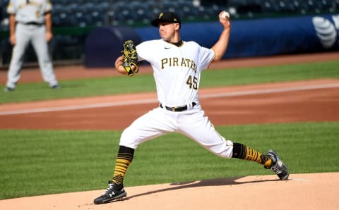 PITTSBURGH, PA – AUGUST 22: Derek Holland #45 of the Pittsburgh Pirates delivers a pitch in the first inning during the game against the Milwaukee Brewers at PNC Park on August 22, 2020 in Pittsburgh, Pennsylvania. (Photo by Justin Berl/Getty Images)