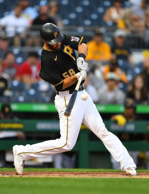 PITTSBURGH, PA – SEPTEMBER 14: Jacob Stallings #58 of the Pittsburgh Pirates hits a RBI single during the first inning against the Cincinnati Reds at PNC Park on September 14, 2021 in Pittsburgh, Pennsylvania. (Photo by Joe Sargent/Getty Images)