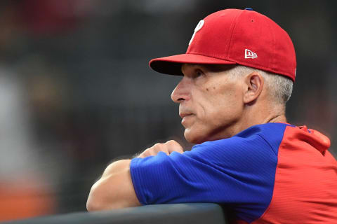 ATLANTA, GA – SEPTEMBER 28: Manager Joe Girardi #25 of the Philadelphia Phillies looks on from the dugout during the fifth inning against the Atlanta Braves at Truist Park on September 28, 2021 in Atlanta, Georgia. (Photo by Adam Hagy/Getty Images)