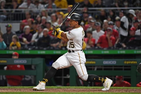 PITTSBURGH, PA – OCTOBER 02: Wilmer Difo #15 of the Pittsburgh Pirates hits a two-run RBI triple in the fifth inning during the game against the Cincinnati Reds at PNC Park on October 2, 2021 in Pittsburgh, Pennsylvania. (Photo by Justin Berl/Getty Images)