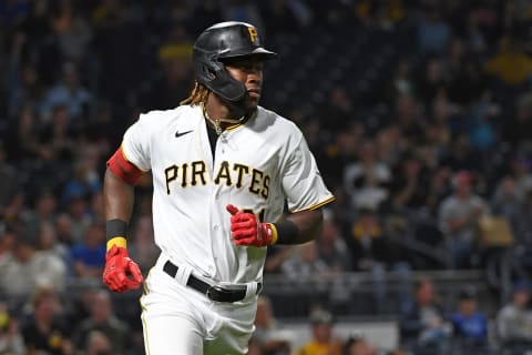 PITTSBURGH, PA – OCTOBER 02: Oneil Cruz #61 of the Pittsburgh Pirates runs to first base after hitting a single in the seventh inning of his major league debut during the game against the Cincinnati Reds at PNC Park on October 2, 2021 in Pittsburgh, Pennsylvania. (Photo by Justin Berl/Getty Images)