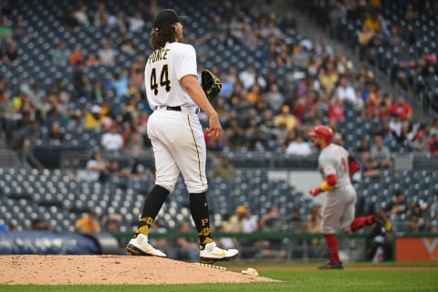 PITTSBURGH, PA – OCTOBER 03: Cody Ponce #44 of the Pittsburgh Pirates steps off the mound as Joey Votto #19 of the Cincinnati Reds rounds the bases after hitting a three run home run in the fifth inning during the game at PNC Park on October 3, 2021 in Pittsburgh, Pennsylvania. (Photo by Justin Berl/Getty Images)