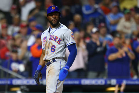 PHILADELPHIA, PA – APRIL 12: Starling Marte #6 of the New York Mets looks to Robinson Cano #24 after scoring on his single during the eighth inning of a game at Citizens Bank Park on April 12, 2022 in Philadelphia, Pennsylvania. The Mets defeated the Phillies 2-0. (Photo by Rich Schultz/Getty Images)