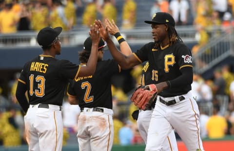 PITTSBURGH, PA – JULY 02: Oneil Cruz #15 of the Pittsburgh Pirates high fives with Ke’Bryan Hayes #13 after the final out in a 7-4 win over the Milwaukee Brewers during the game at PNC Park on July 2, 2022 in Pittsburgh, Pennsylvania. (Photo by Justin Berl/Getty Images)