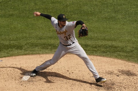 CHICAGO, ILLINOIS – AUGUST 02: Geoff Hartlieb #32 of the Pittsburgh Pirates throws a pitch against the Chicago Cubs during the fifth inning of a game at Wrigley Field on August 02, 2020 in Chicago, Illinois. (Photo by Nuccio DiNuzzo/Getty Images)