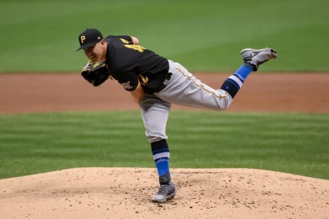 MILWAUKEE, WISCONSIN – AUGUST 28: Derek Holland #42 of the Pittsburgh Pirates pitches in the second inning against the Milwaukee Brewers at Miller Park on August 28, 2020 in Milwaukee, Wisconsin. All players are wearing #42 in honor of Jackie Robinson Day. The day honoring Jackie Robinson, traditionally held on April 15, was rescheduled due to the COVID-19 pandemic. (Photo by Dylan Buell/Getty Images)