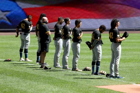 MILWAUKEE, WISCONSIN – AUGUST 30: Members of the Pittsburgh Pirates stand for the singing of the national anthem before the game against the Milwaukee Brewers at Miller Park on August 30, 2020 in Milwaukee, Wisconsin. All players are wearing #42 in honor of Jackie Robinson Day, which was postponed April 15 due to the coronavirus outbreak. (Photo by Dylan Buell/Getty Images)