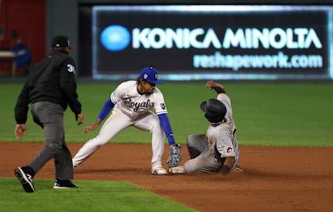 KANSAS CITY, MISSOURI – SEPTEMBER 11: Ke’Bryan Hayes #13 of the Pittsburgh Pirates slides safely into second base to steal as Adalberto Mondesi #27 of the Kansas City Royals is late applying the tag during the 5th inning of the game at Kauffman Stadium on September 11, 2020 in Kansas City, Missouri. (Photo by Jamie Squire/Getty Images)