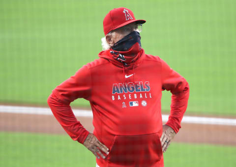 SAN DIEGO, CALIFORNIA – SEPTEMBER 22: Manager Joe Maddon of the Los Angeles Angels looks on prior to a game against the San Diego Padres at PETCO Park on September 22, 2020 in San Diego, California. (Photo by Sean M. Haffey/Getty Images)