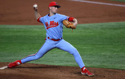 ARLINGTON, TEXAS – FEBRUARY 22: Derek Diamond #2 of the Mississippi Rebels throws against the Texas Longhorns in the first inning during the 2021 State Farm College Baseball Showdown at Globe Life Field on February 22, 2021 in Arlington, Texas. (Photo by Ronald Martinez/Getty Images)