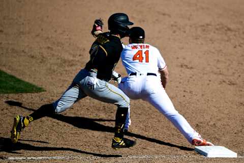 SARASOTA, FLORIDA – MARCH 15: Tyler Nevin #41 of the Baltimore Orioles forces out Travis Swaggerty #75 of the Pittsburgh Pirates during the ninth inning of a spring training game at Ed Smith Stadium on March 15, 2021 in Sarasota, Florida. (Photo by Douglas P. DeFelice/Getty Images)